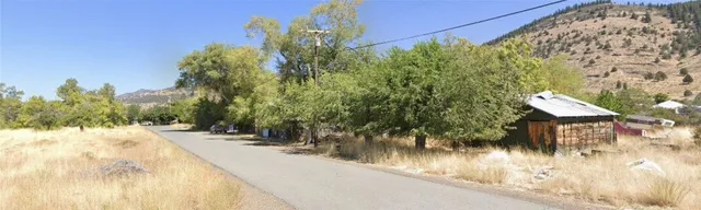 a view of a backyard of a house