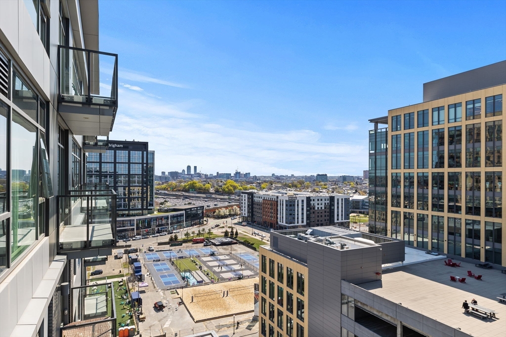 375 Canal Street, Unit PH101 Somerville, MA 02145 - Photo 22 of 39 a view of a balcony with city view