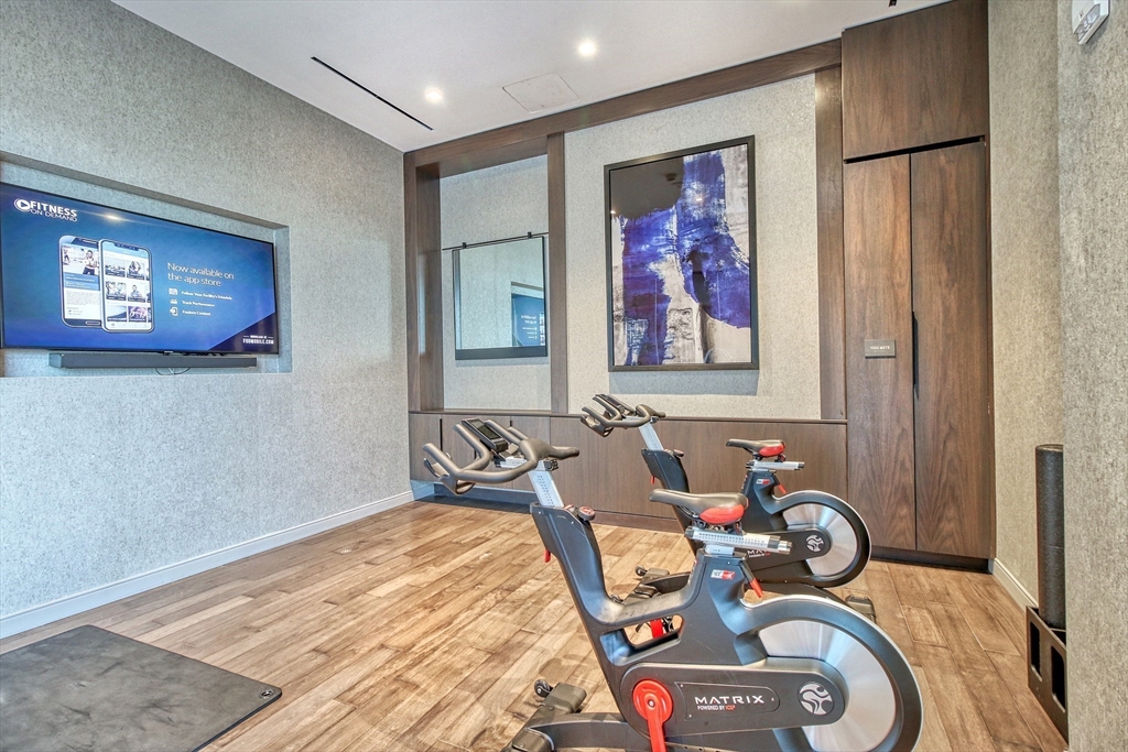 375 Canal Street, Unit PH101 Somerville, MA 02145 - Photo 24 of 39 a bedroom with a bed and furniture