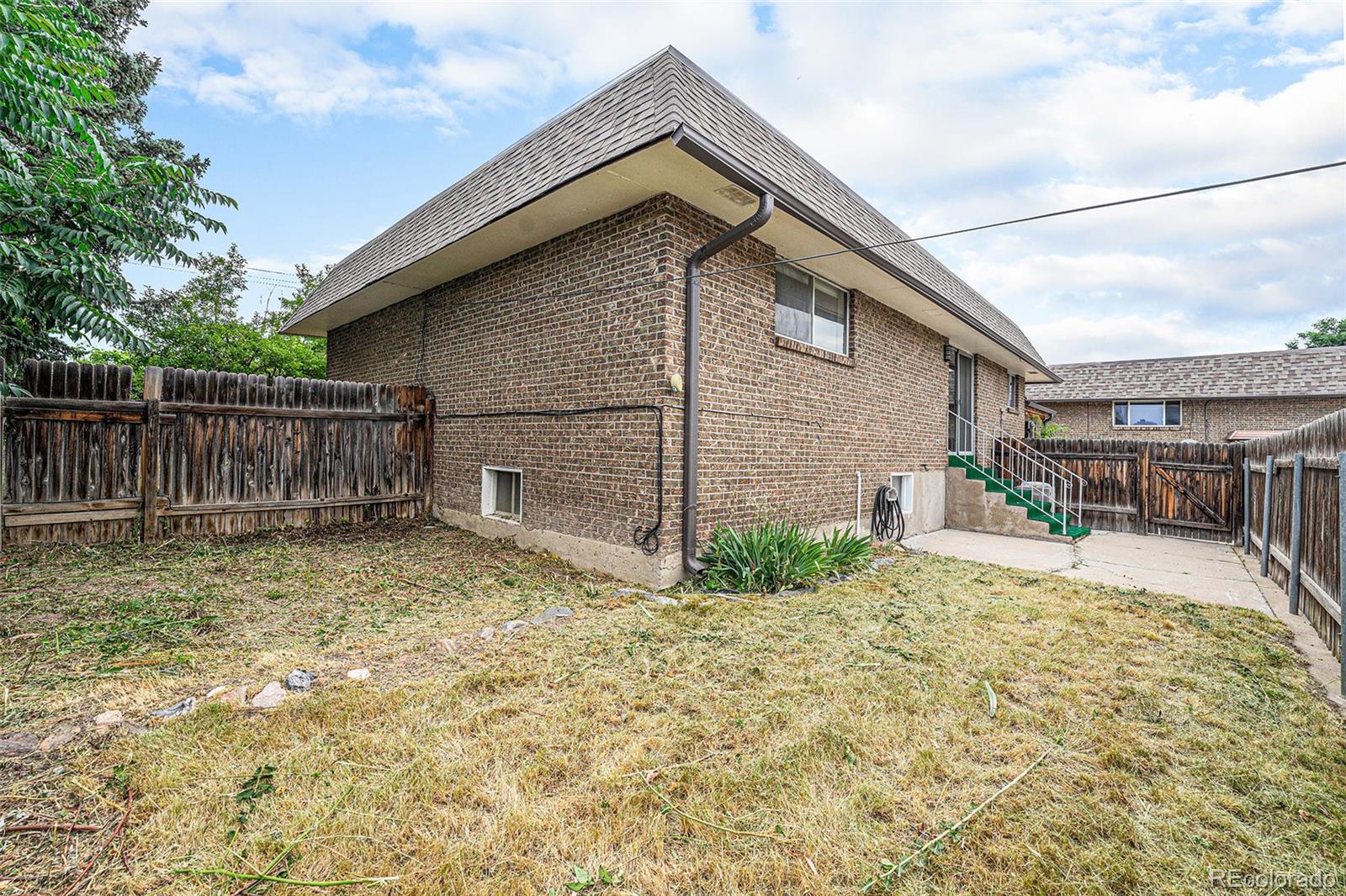 1830 Simms Street Lakewood, CO 80215 - Photo 27 of 31 a house view with backyard space