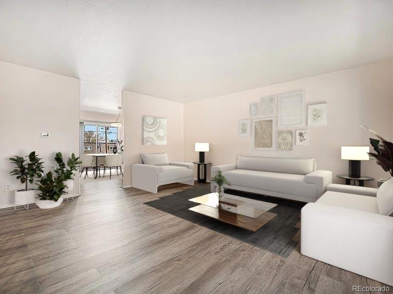 1830 Simms Street Lakewood, CO 80215 - Photo 6 of 31 a living room with furniture wooden floor and a potted plant