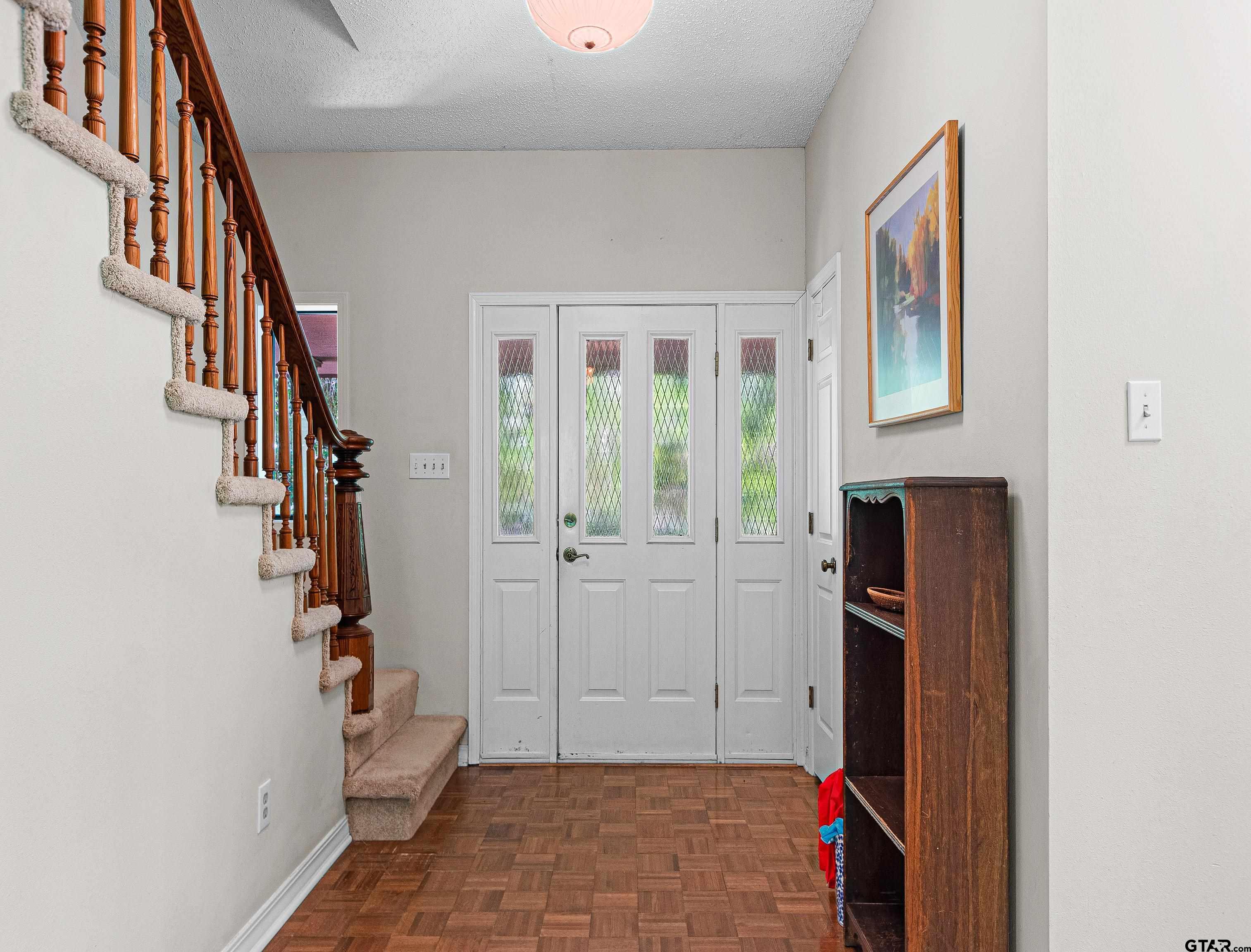 18862 Big Timber Road Tyler, TX 75703 - Photo 11 of 33 a view of an entryway with wooden floor