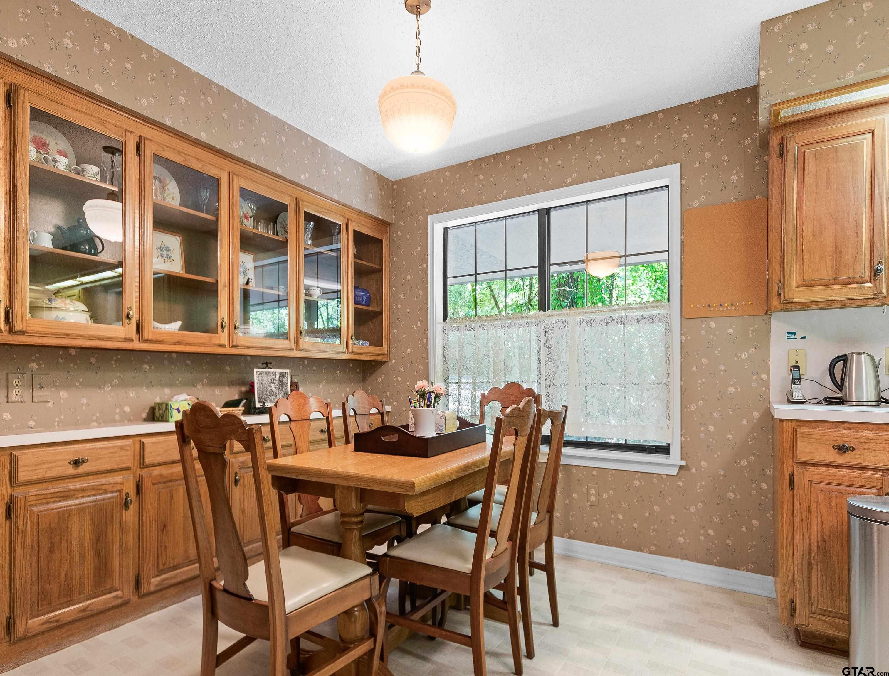 18862 Big Timber Road Tyler, TX 75703 - Photo 16 of 33 a dining room with furniture and window