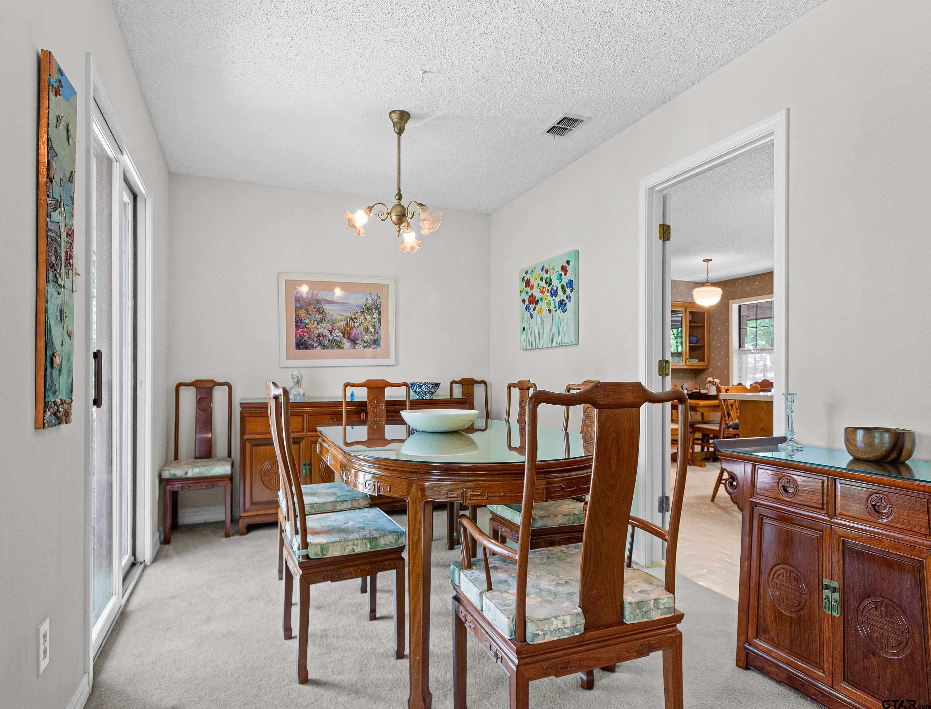18862 Big Timber Road Tyler, TX 75703 - Photo 17 of 33 a view of a dining room with furniture