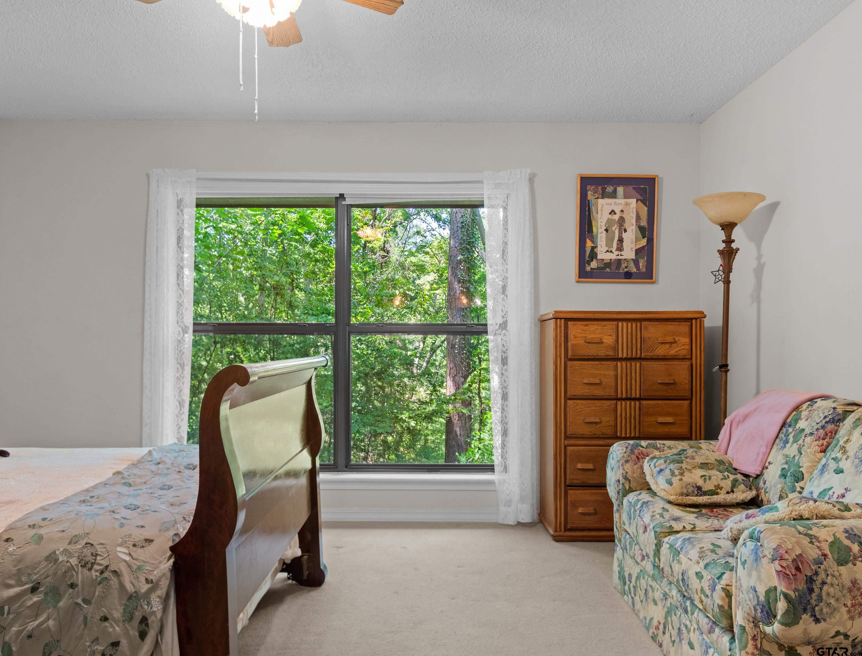 18862 Big Timber Road Tyler, TX 75703 - Photo 20 of 33 a living room with furniture and a window