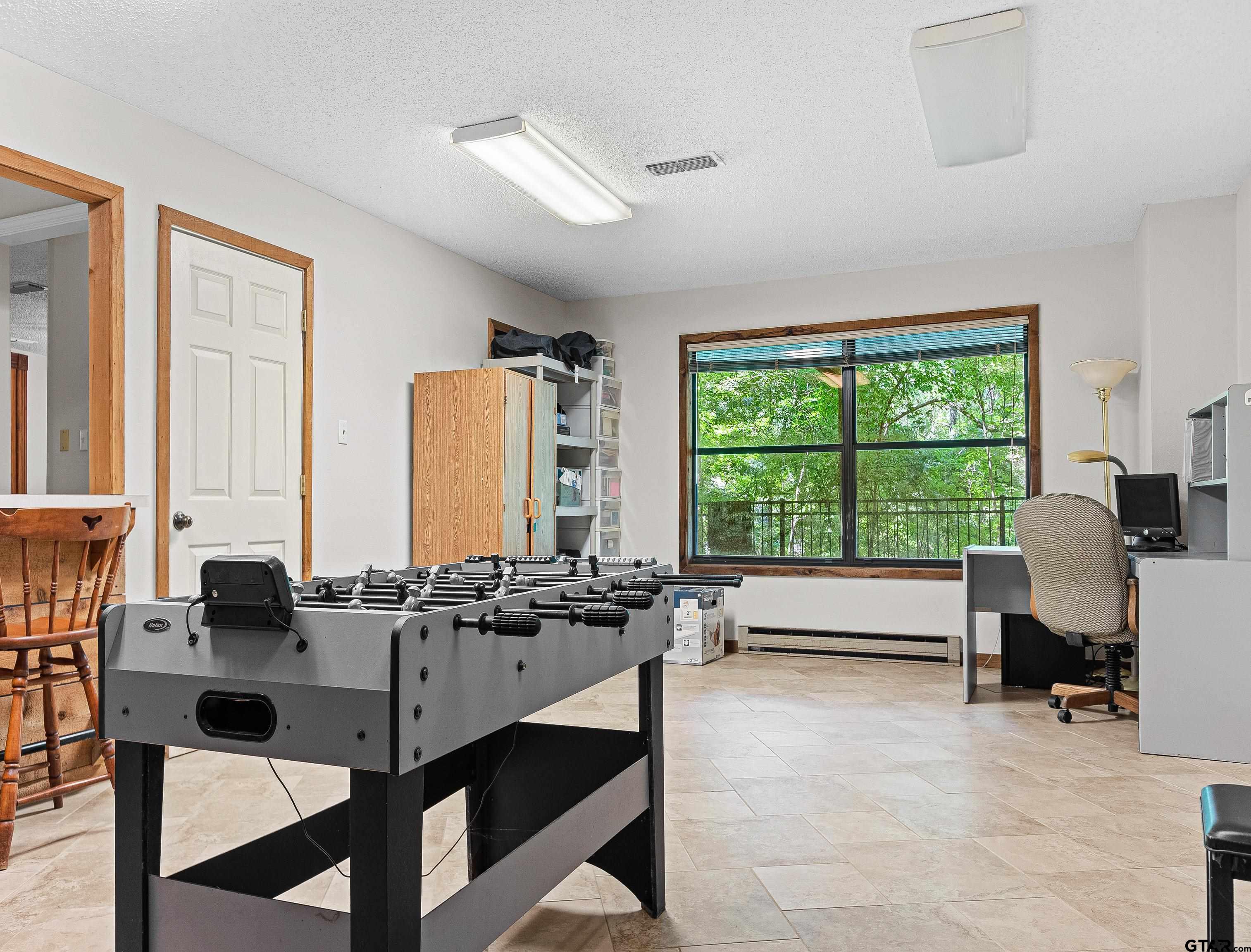 18862 Big Timber Road Tyler, TX 75703 - Photo 25 of 33 a view of a livingroom with furniture and a window