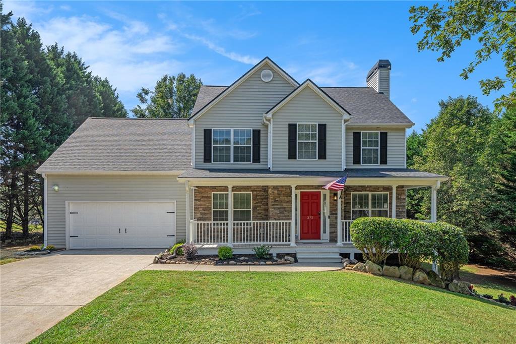 front view of a house with a yard