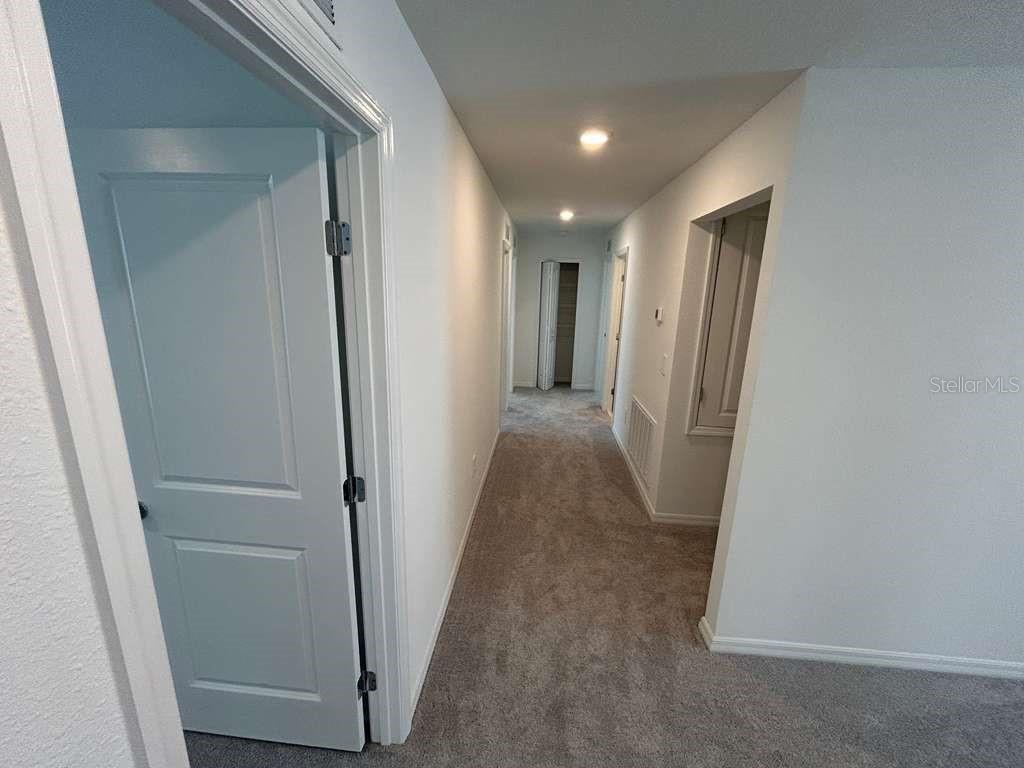 1140 Hour Glass Road Lakeland, FL 33801 - Photo 13 of 24 a view of a hallway