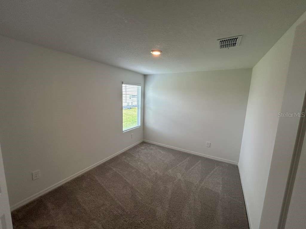 1140 Hour Glass Road Lakeland, FL 33801 - Photo 20 of 24 a view of empty room