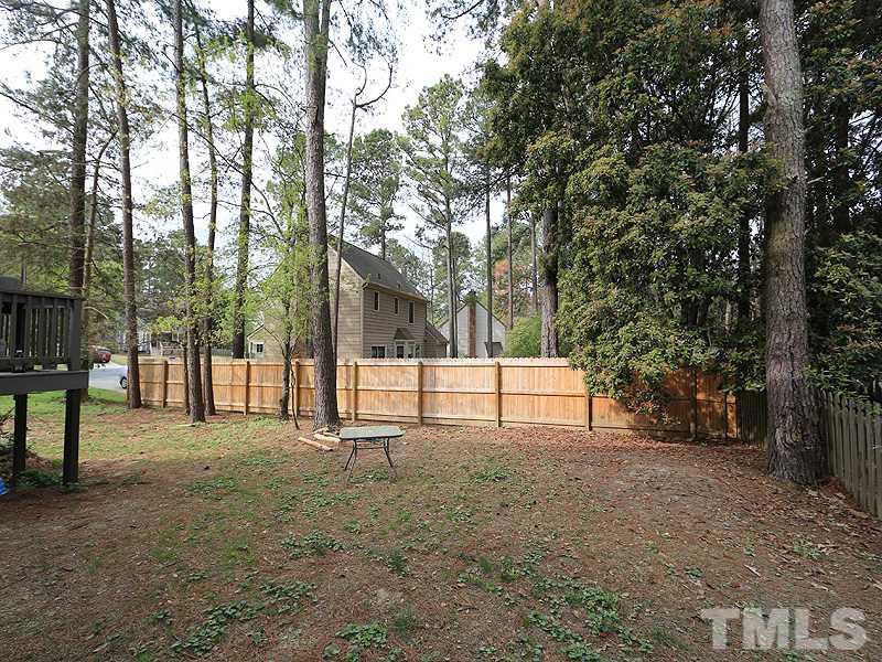 7301 Ewing Place Raleigh, NC 27616 - Photo 11 of 12 a view of backyard with tree