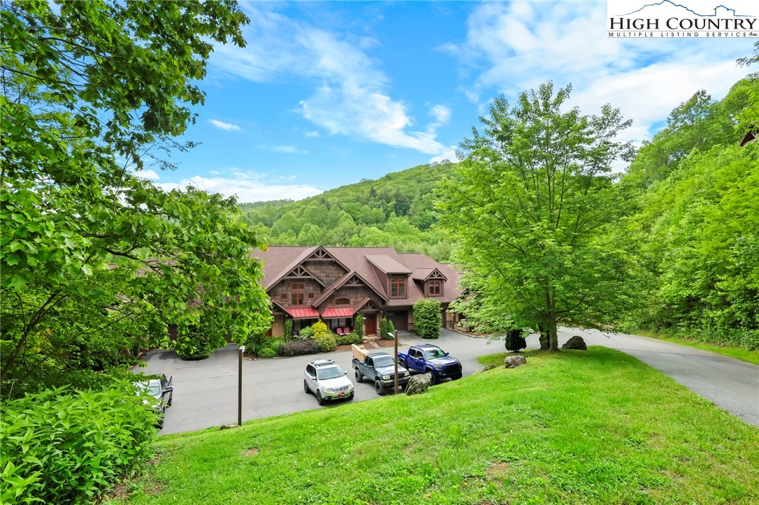 138 South Camp Road, Unit 103 Boone, NC 28607 - Photo 3 of 50 a aerial view of a house with garden space and sitting area