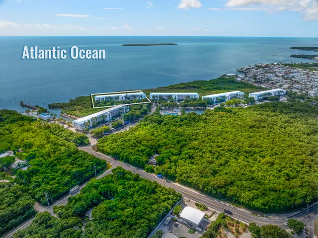 a view of a car park in front of a building