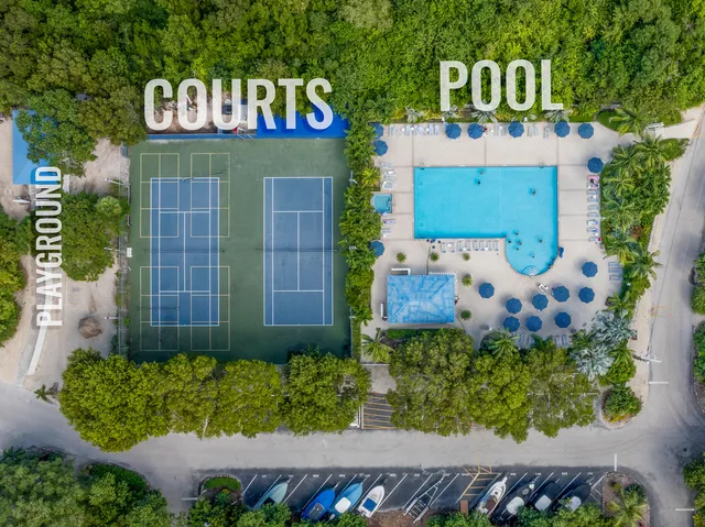 a front view of a house with sitting area