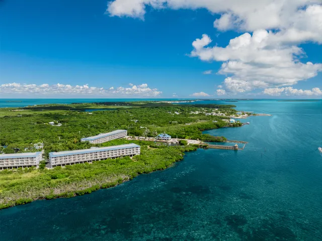 a view of building with green space