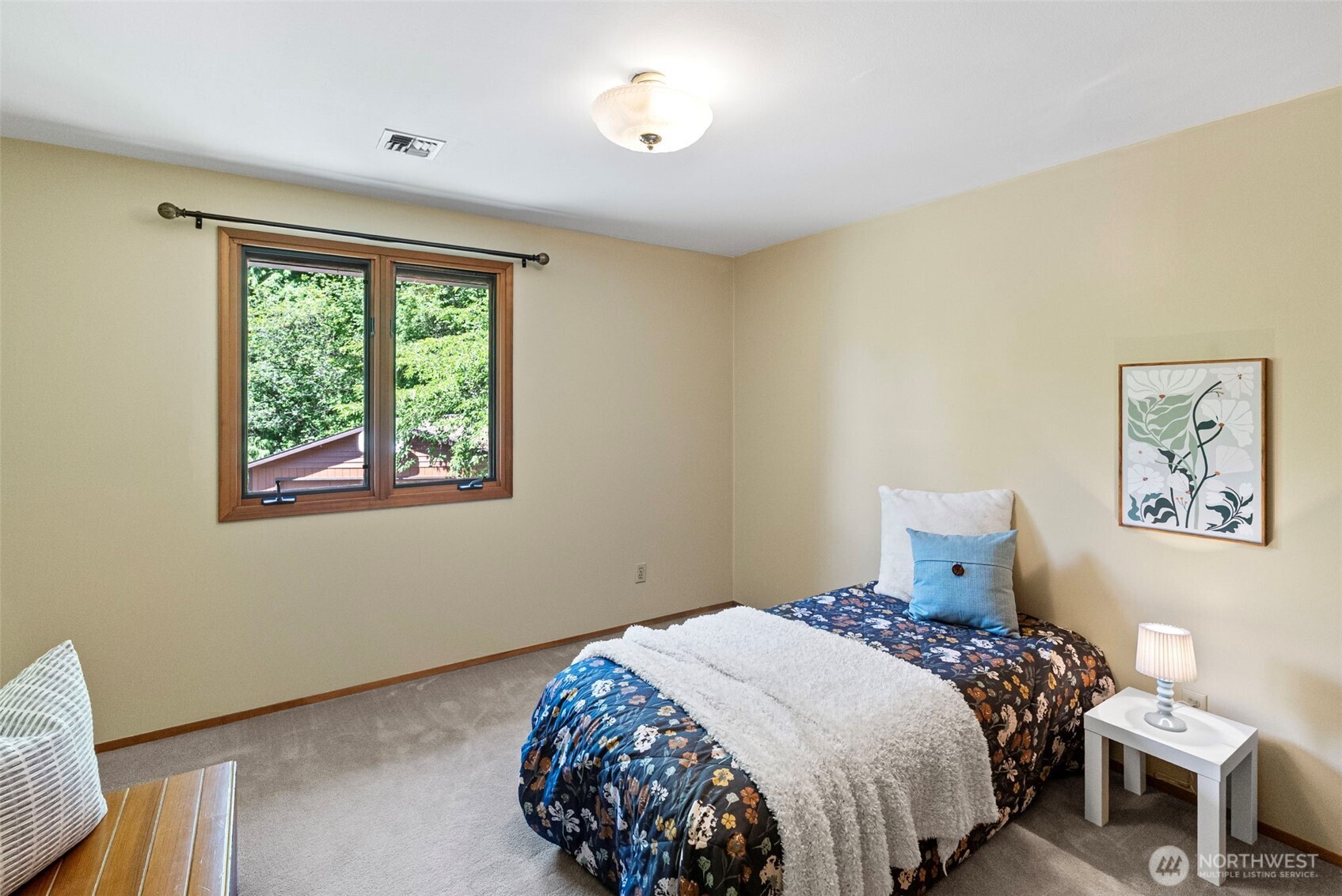 200 Lakenes Road Quilcene, WA 98376 - Photo 22 of 40 a bedroom with a bed and a window