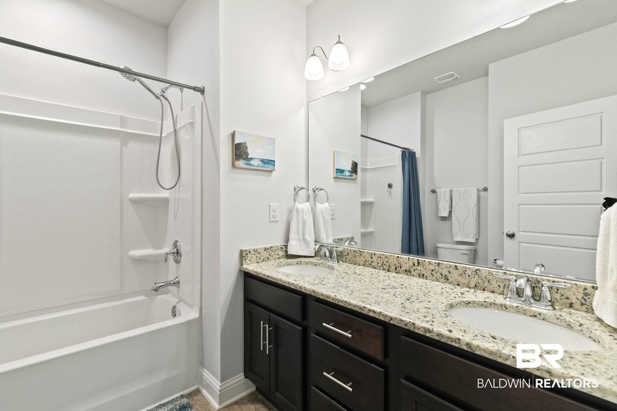 31350 Hoot Owl Road Daphne, AL 36527 - Photo 36 of 94 Bathroom featuring double vanity and shower / bath combo with shower curtain