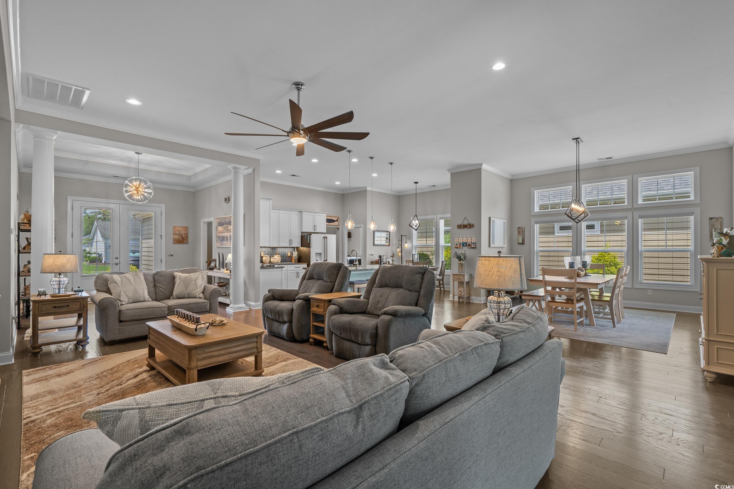 1380 Culbertson Avenue Myrtle Beach, SC 29577 - Photo 11 of 50 Living area with hardwood / wood-style flooring, a ceiling fan, ornamental molding, recessed lighting, and ornate columns