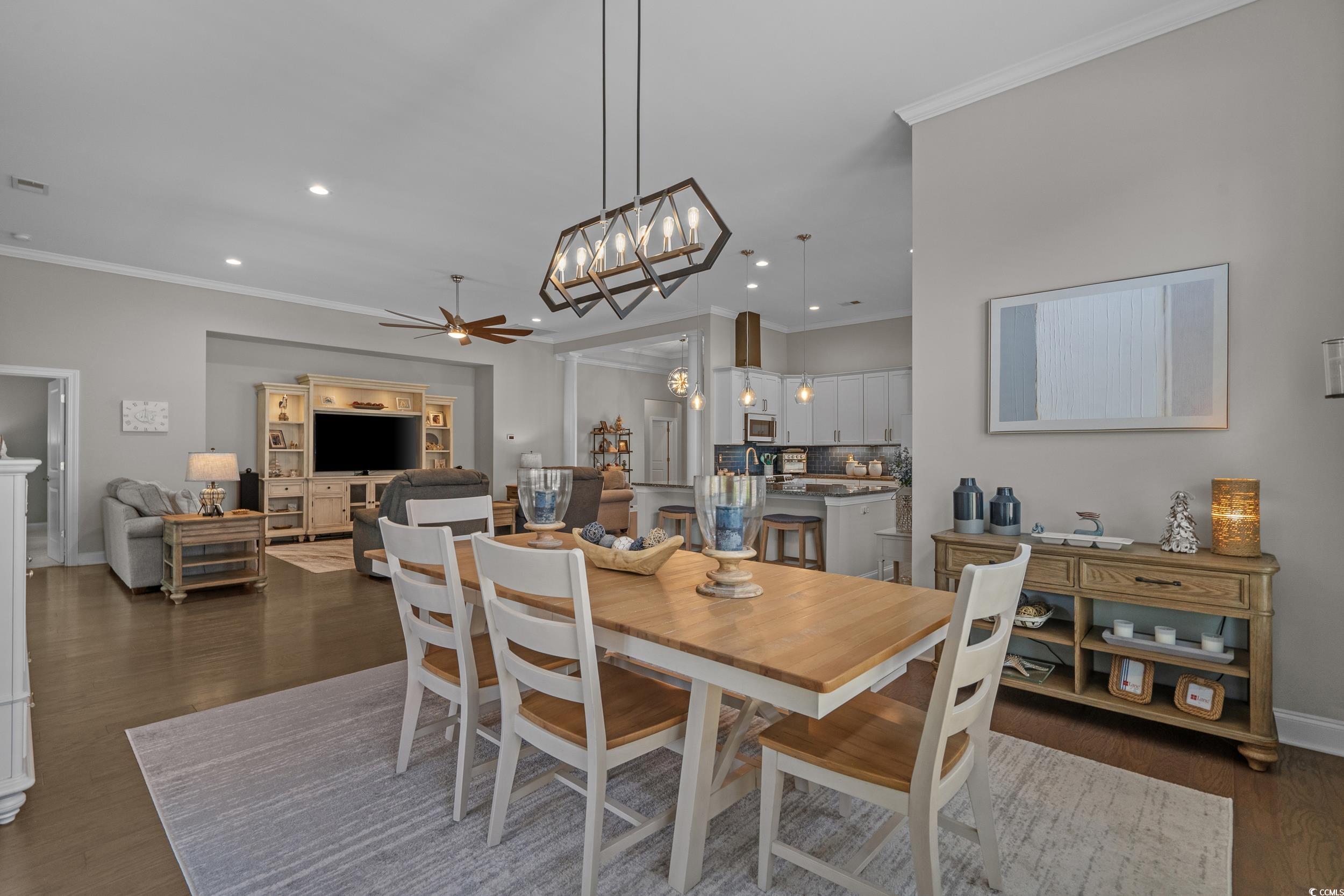 1380 Culbertson Avenue Myrtle Beach, SC 29577 - Photo 13 of 50 Dining area with ceiling fan, ornamental molding, dark wood-style floors, a chandelier, and recessed lighting