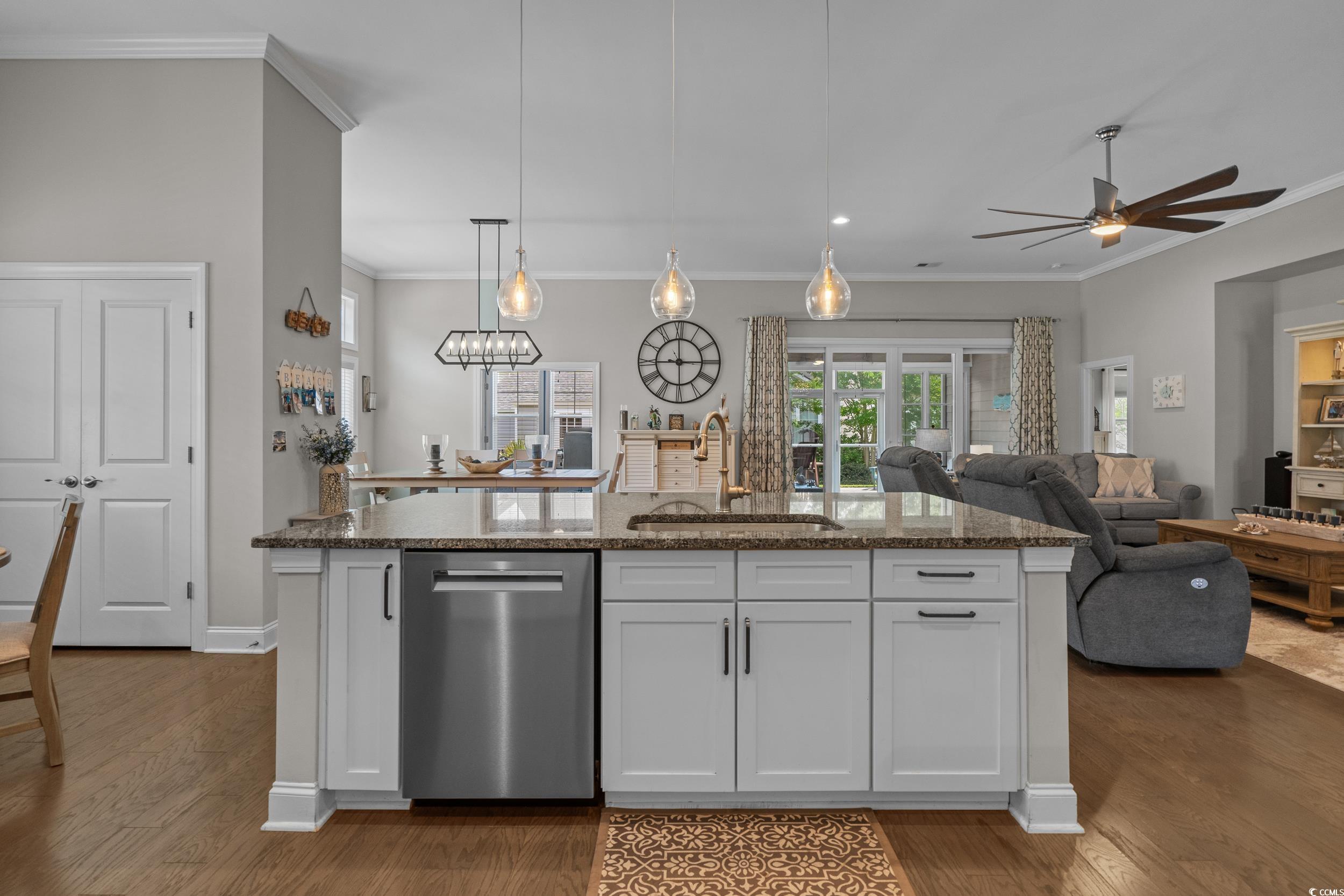 1380 Culbertson Avenue Myrtle Beach, SC 29577 - Photo 18 of 50 Kitchen with dishwasher, a sink, dark stone counters, white cabinets, and ceiling fan