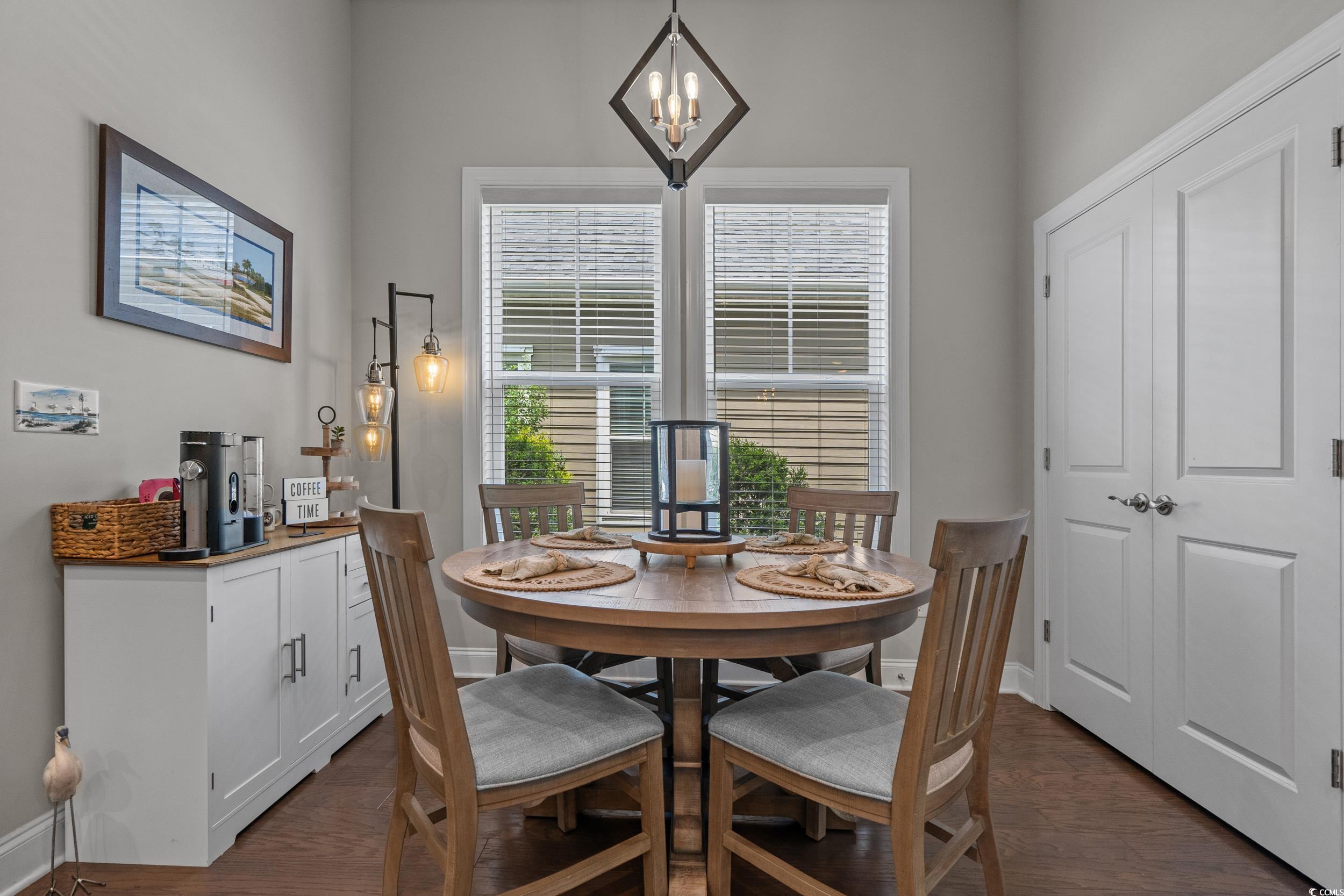 1380 Culbertson Avenue Myrtle Beach, SC 29577 - Photo 19 of 50 Dining area with healthy amount of natural light, a chandelier, and baseboards
