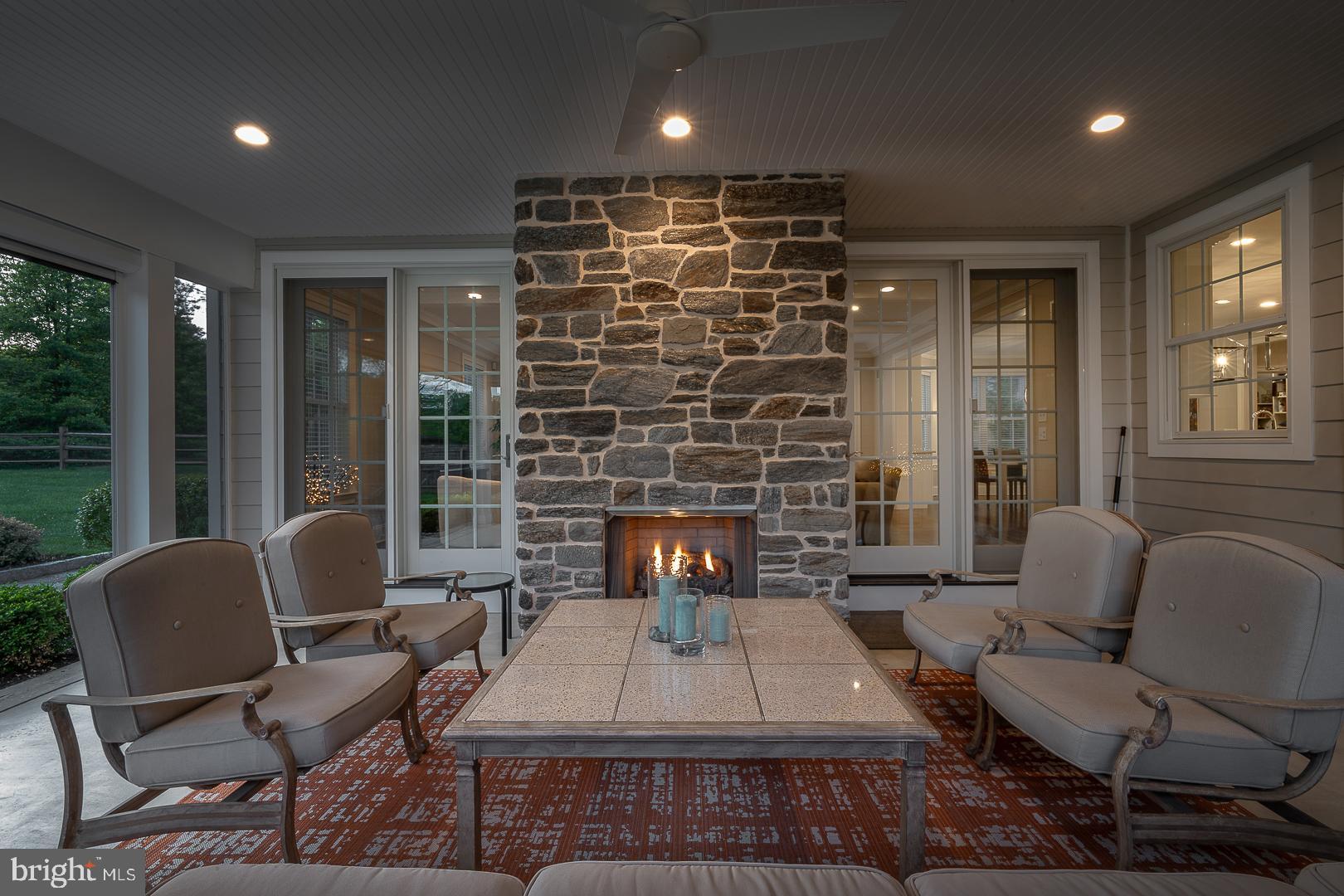 792 North Wayne Avenue Wayne, PA 19087 - Photo 51 of 53 Enjoy gathering with friends by the fireplace