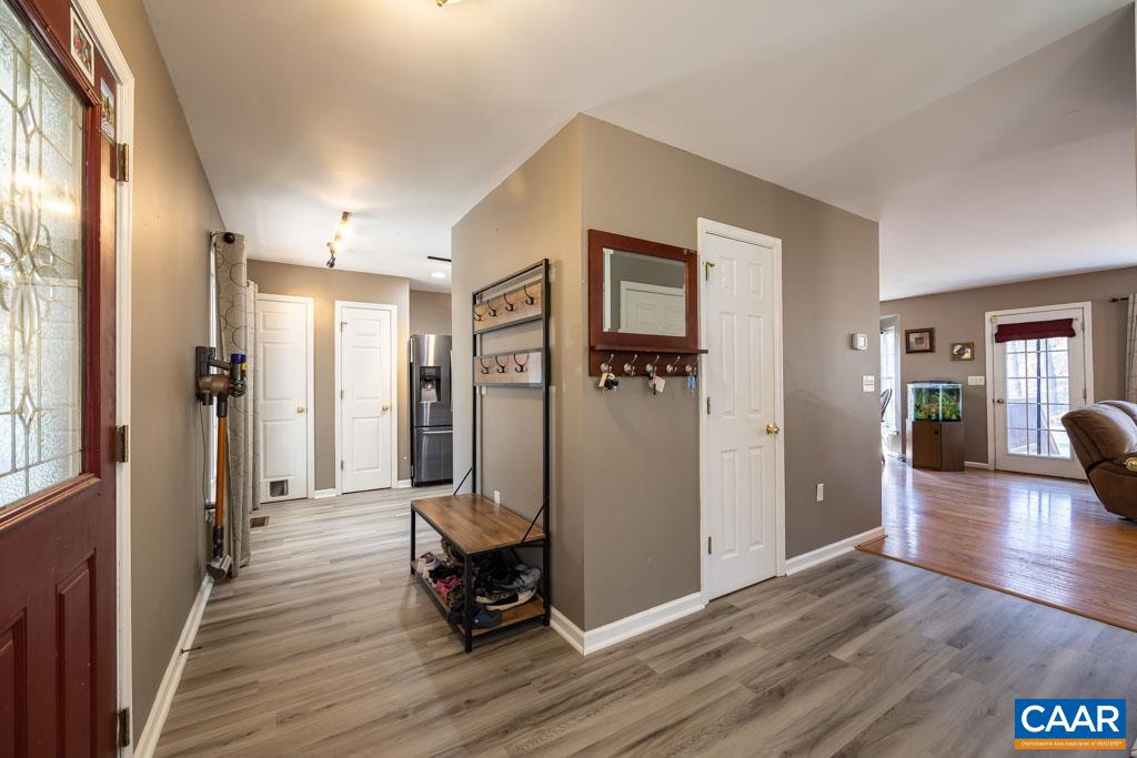 1605 Beautiful Run Road Aroda, VA 22709 - Photo 14 of 63 a view of a livingroom with wooden floor and furniture