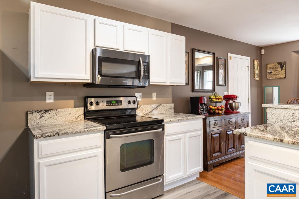 1605 Beautiful Run Road Aroda, VA 22709 - Photo 16 of 63 a kitchen with a stove and a microwave