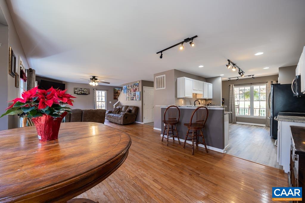 1605 Beautiful Run Road Aroda, VA 22709 - Photo 20 of 63 a living room with furniture dining room and wooden floor