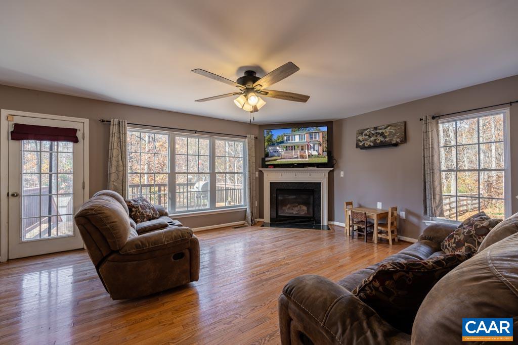 1605 Beautiful Run Road Aroda, VA 22709 - Photo 21 of 63 a living room with furniture and a fireplace