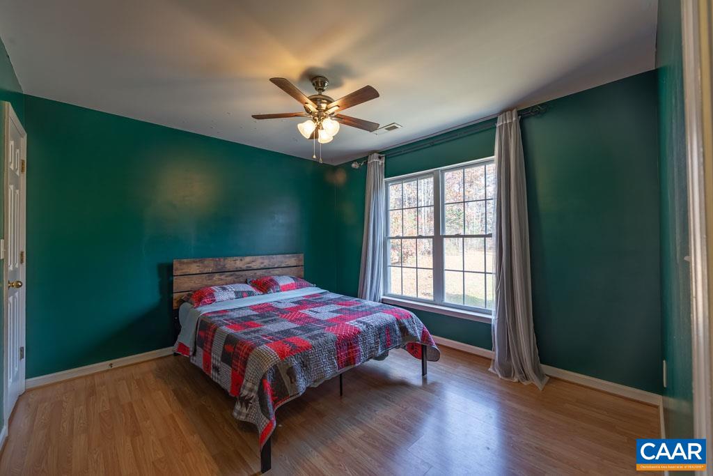 1605 Beautiful Run Road Aroda, VA 22709 - Photo 27 of 63 a bedroom with a bed and a window