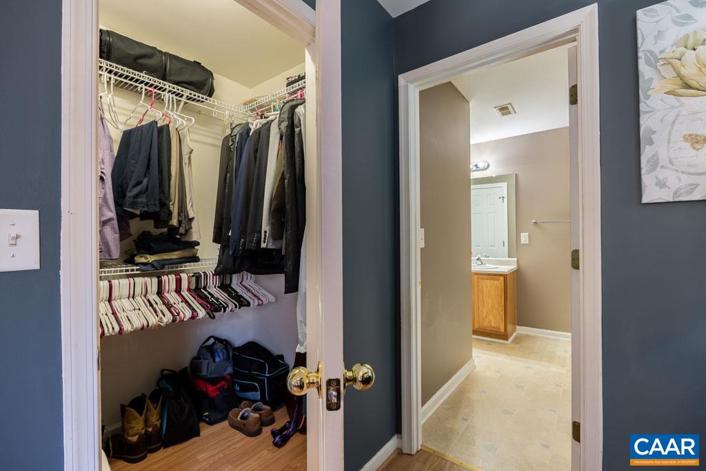 1605 Beautiful Run Road Aroda, VA 22709 - Photo 33 of 63 a view of walk in closet with clothes and shoes