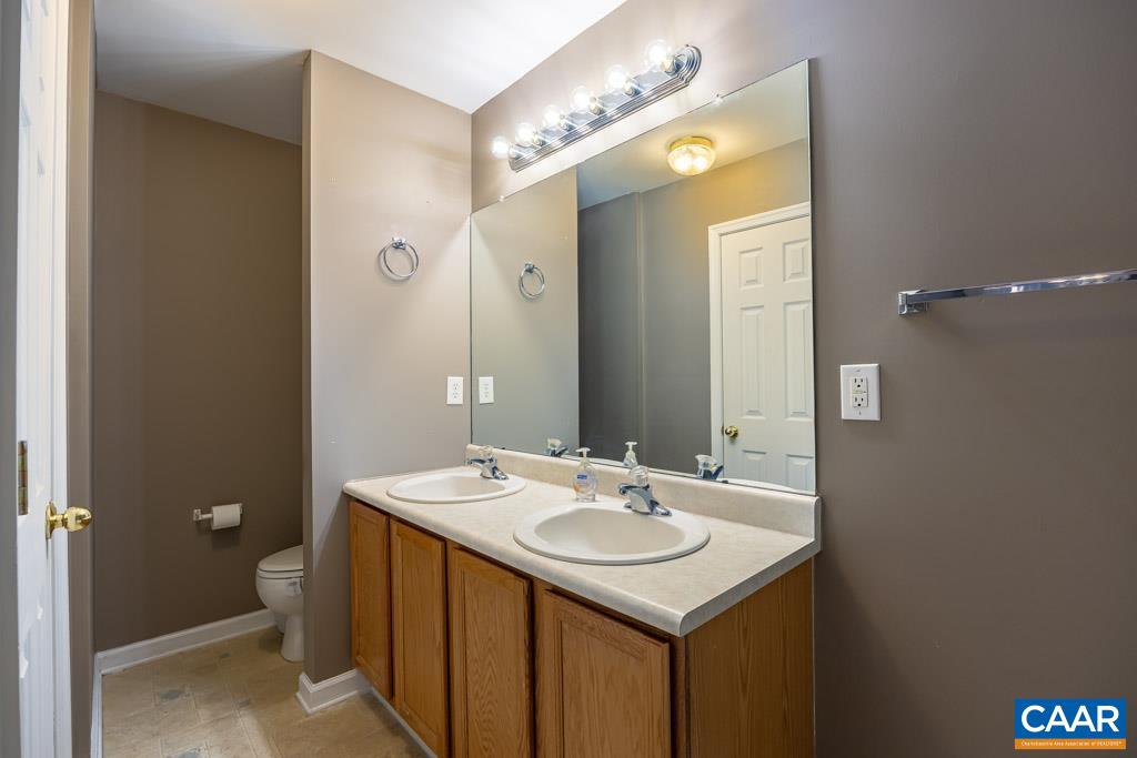 1605 Beautiful Run Road Aroda, VA 22709 - Photo 34 of 63 a bathroom with a sink and a mirror