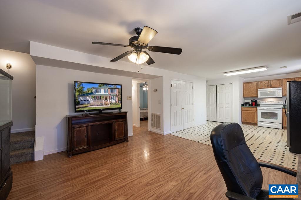 1605 Beautiful Run Road Aroda, VA 22709 - Photo 38 of 63 a living room with furniture and a flat screen tv