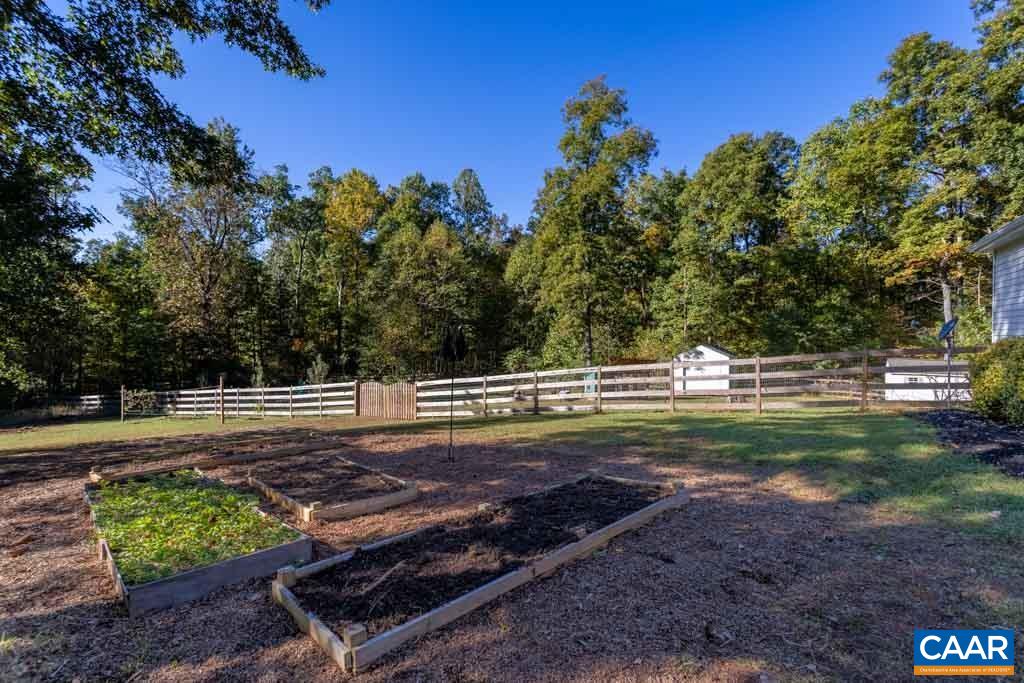 1605 Beautiful Run Road Aroda, VA 22709 - Photo 4 of 63 a view of a backyard with trees