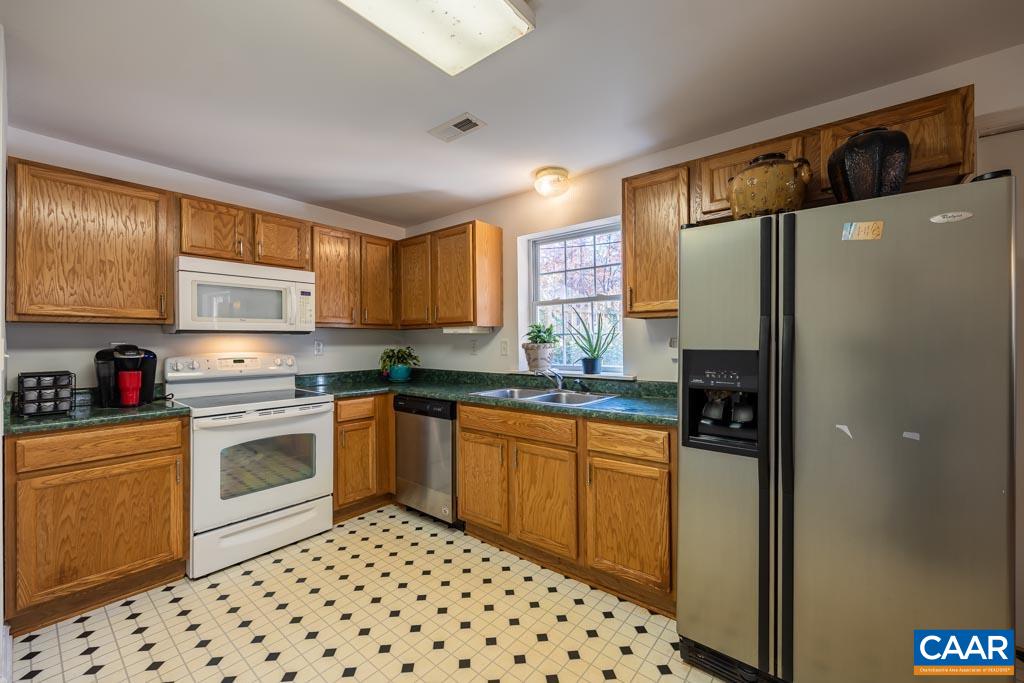 1605 Beautiful Run Road Aroda, VA 22709 - Photo 5 of 63 a kitchen with granite countertop a refrigerator stove top oven and sink