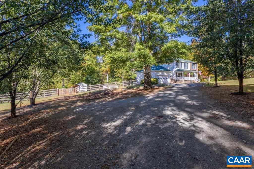 1605 Beautiful Run Road Aroda, VA 22709 - Photo 6 of 63 a view of a tree in front of a house