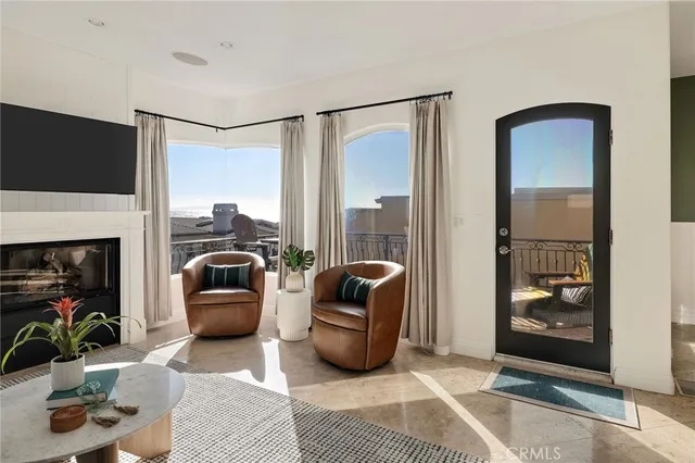 a view of a balcony with furniture