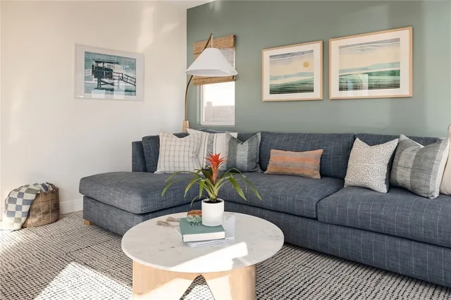a kitchen with a sink and a large window