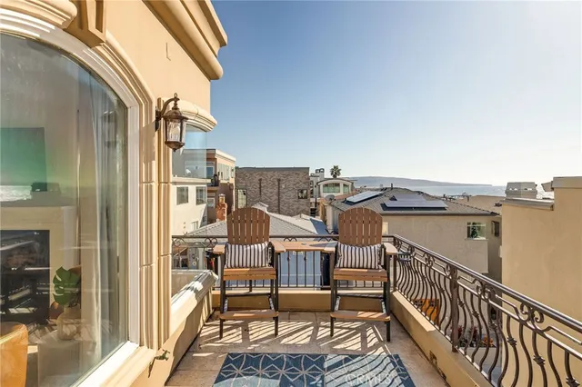 a kitchen with granite countertop a stove a sink and a cabinets