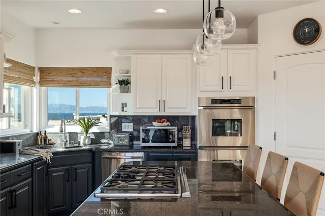 a bedroom with furniture and a flat screen tv
