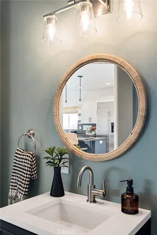 a bedroom with a large bed and a flat screen tv