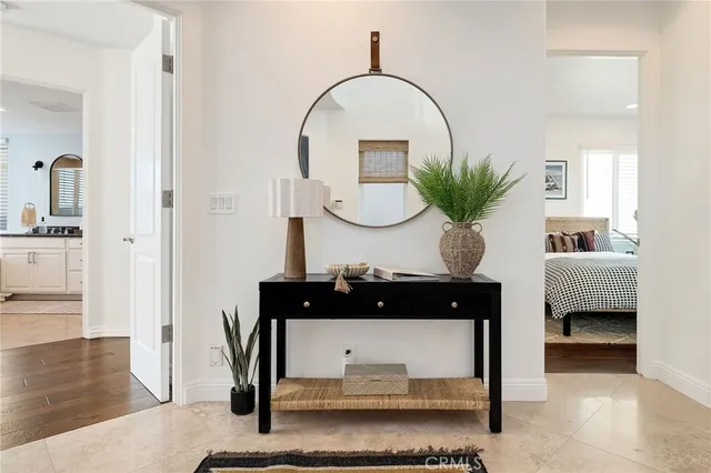 a bathroom with a granite countertop sink a mirror and a