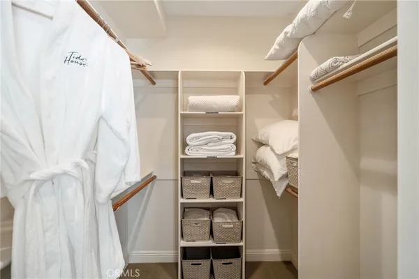 a bath tub sitting in a bathroom next to a window