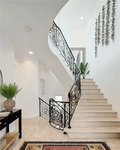 a kitchen with stainless steel appliances granite countertop a stove and a refrigerator