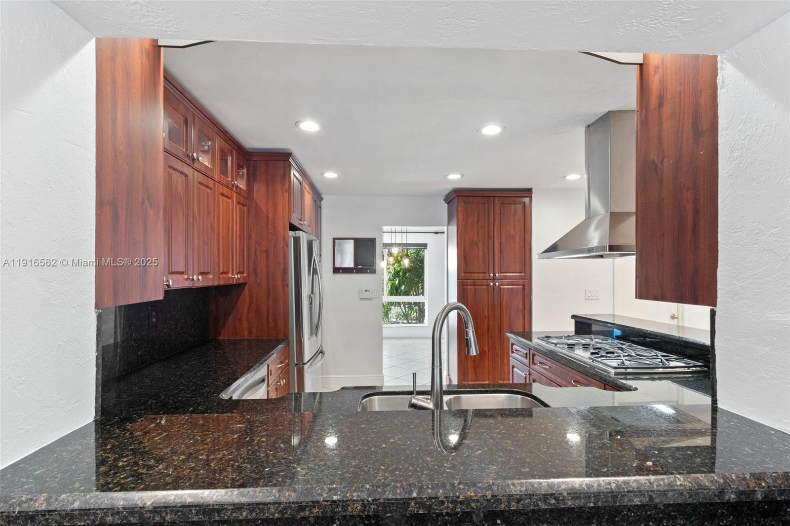 10485 Southwest 109th Street Miami, FL 33176 - Photo 12 of 45 a view of a hall with wooden floor