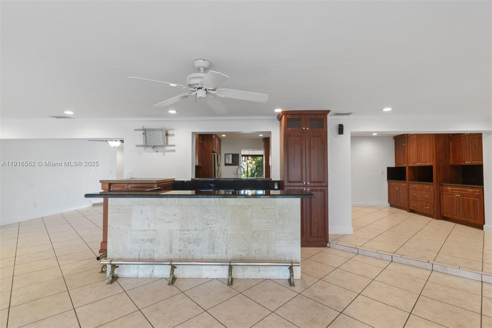 10485 Southwest 109th Street Miami, FL 33176 - Photo 17 of 45 a kitchen with stainless steel appliances a sink and a refrigerator