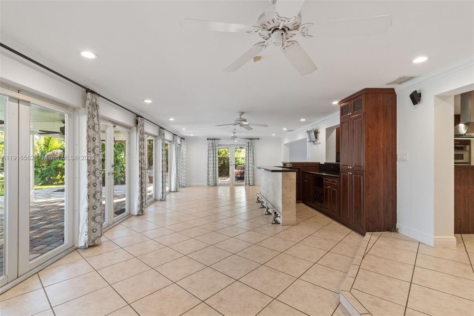 10485 Southwest 109th Street Miami, FL 33176 - Photo 20 of 45 a view of kitchen with furniture and refrigerator