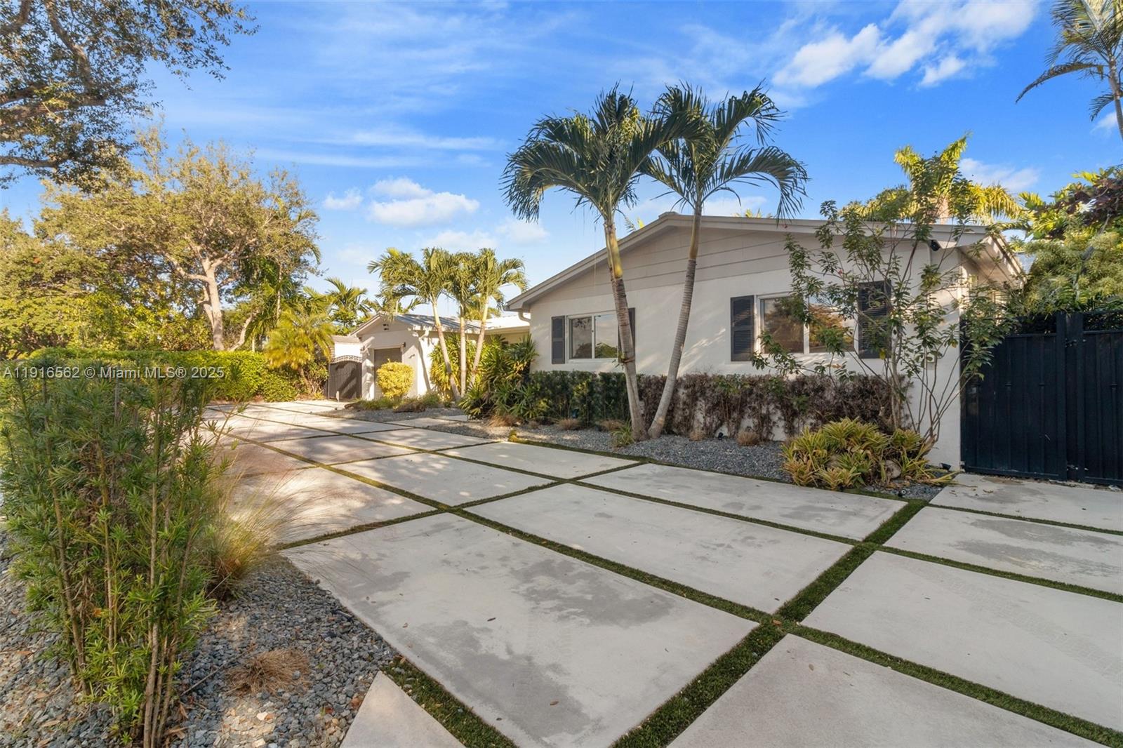 10485 Southwest 109th Street Miami, FL 33176 - Photo 43 of 45 a house view with a outdoor space