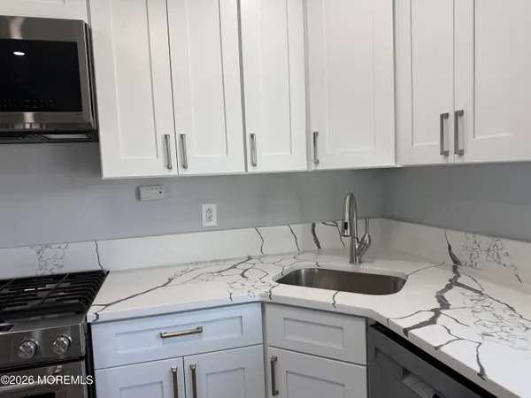 a view of a hallway with front door