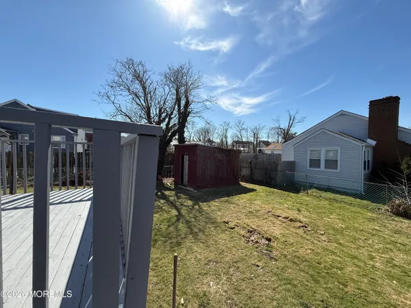 a view of wooden floor in a bathroom